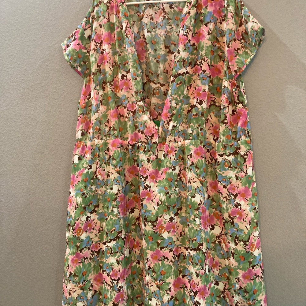new floral print dress only worn once, ties in the back and is sheer on top